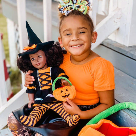 girl and doll matching halloween costumes